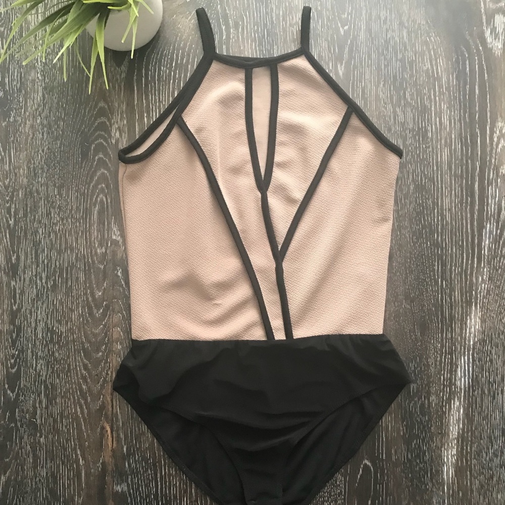 PROFESSIONAL TAN AND BLACK BODYSUIT
